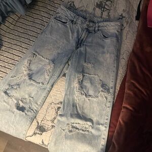 Denim jeans with rips